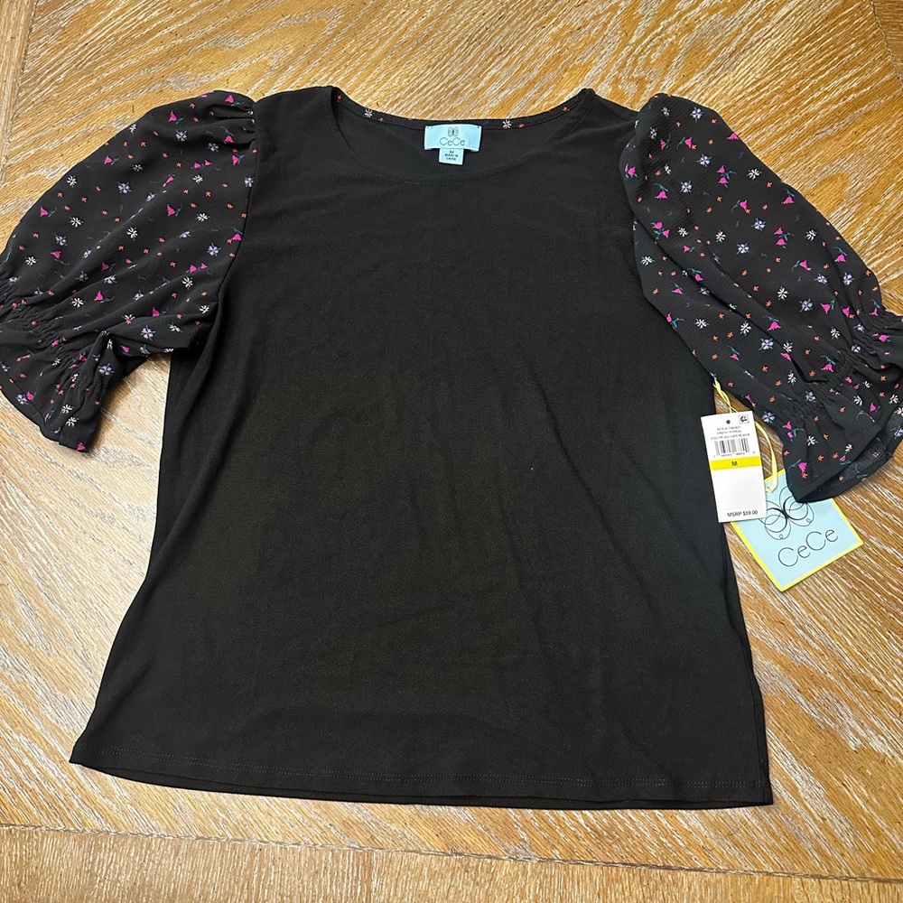 CeCe Black Top with sheer floral elbow Sleeves Womens Medium NWT